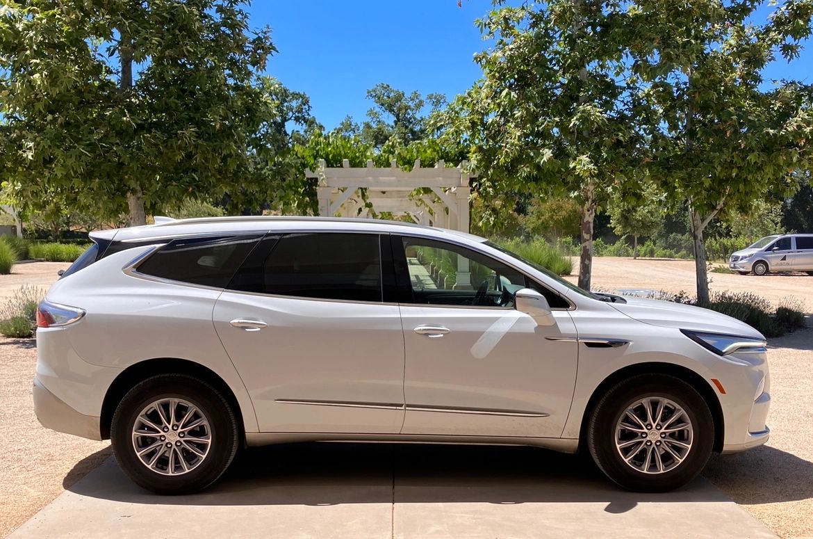 White SUV parked at an Edna Valley winery, an example of the guest's own vehicle a Destination Drivers driver takes on a wine tour