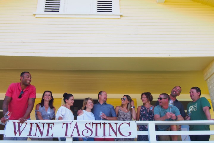 a group of people standing in front of a crowd